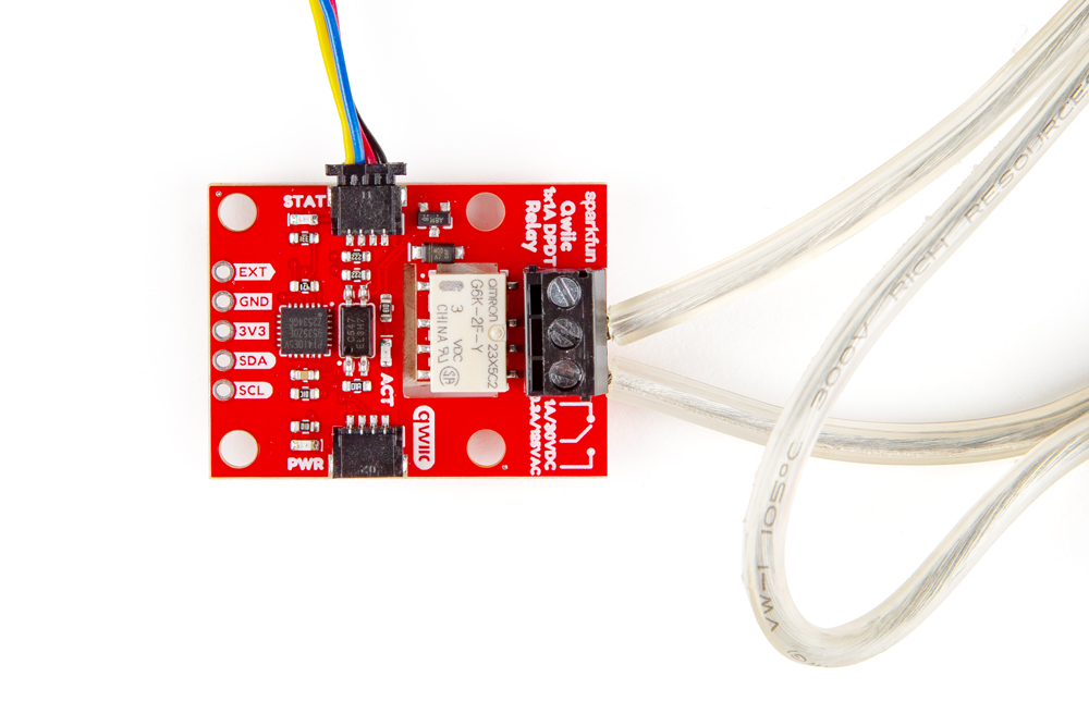 Close up photo of the AC load wires connected to the Qwiic Relay screw terminals